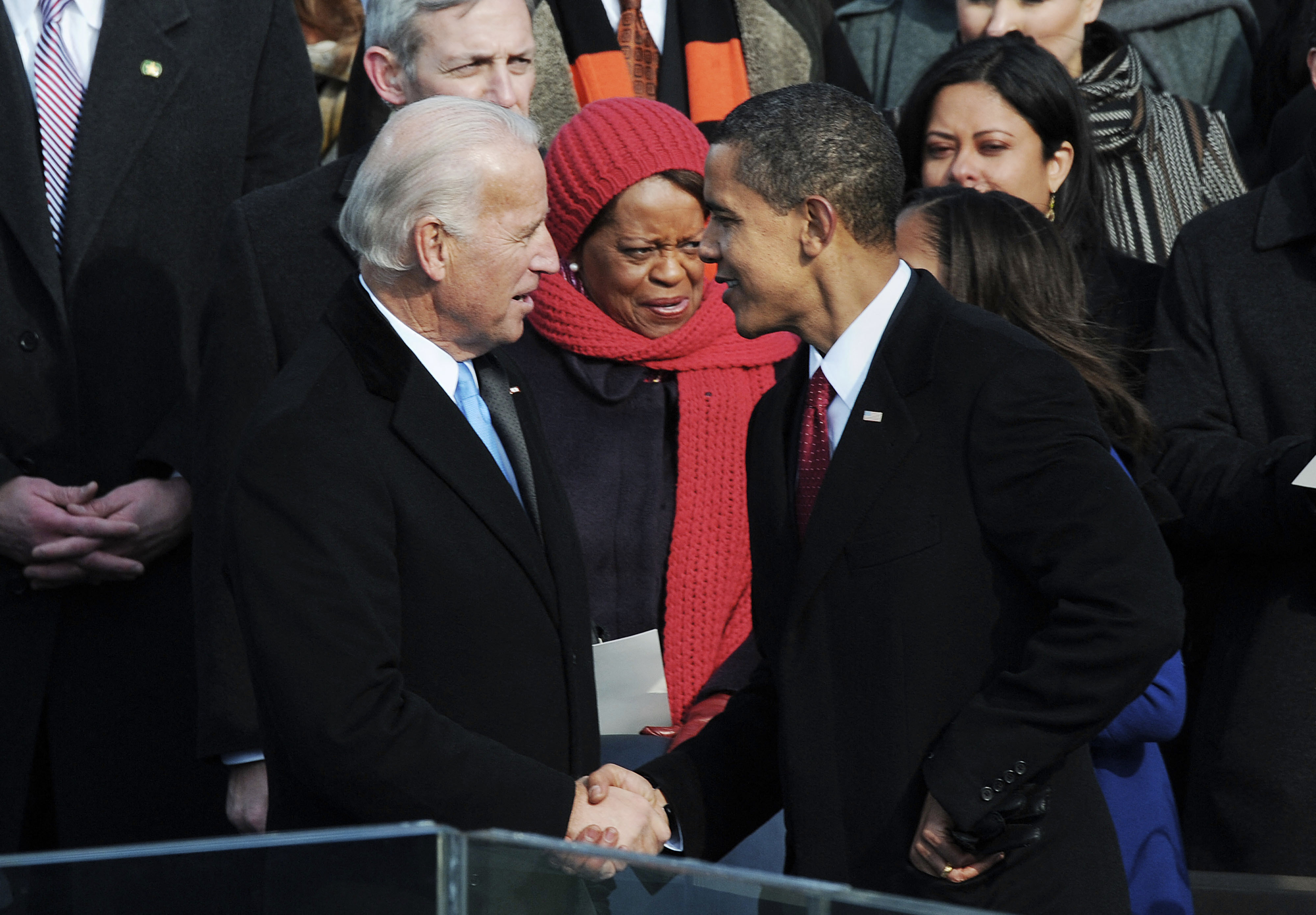 President Biden shaking hands with Previous President Obama